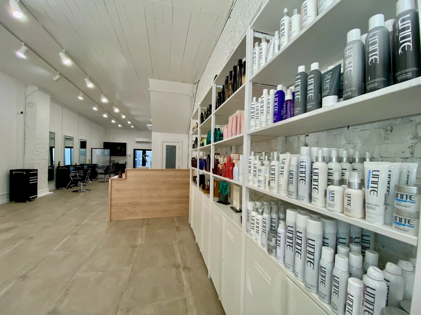 Salon interior and product shelves at The Studio Los Gatos