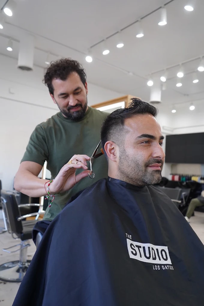 A men’s haircut in progress at The Studio Los Gatos