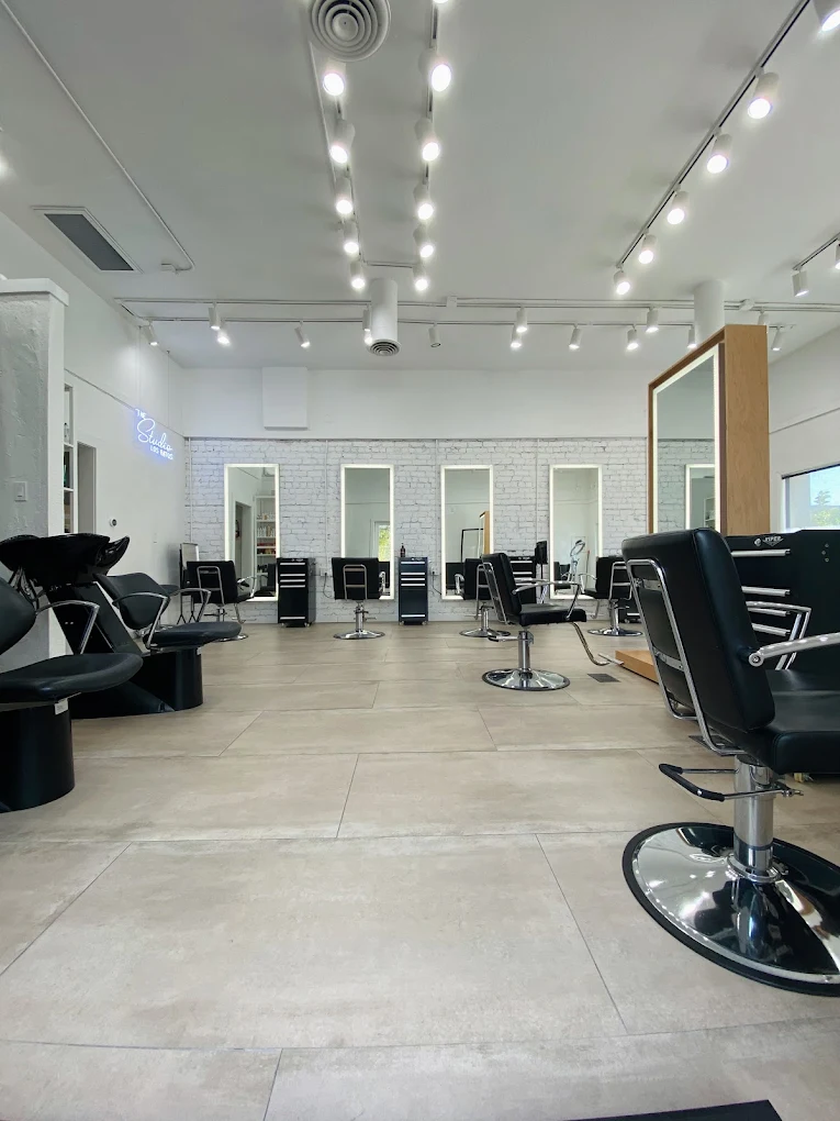The Studio Los Gatos interior with styling mirrors and chairs
