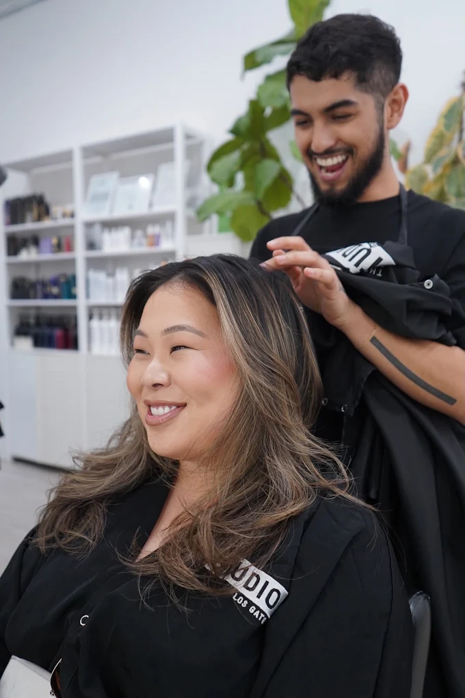 A stylist working with a client at The Studio Los Gatos